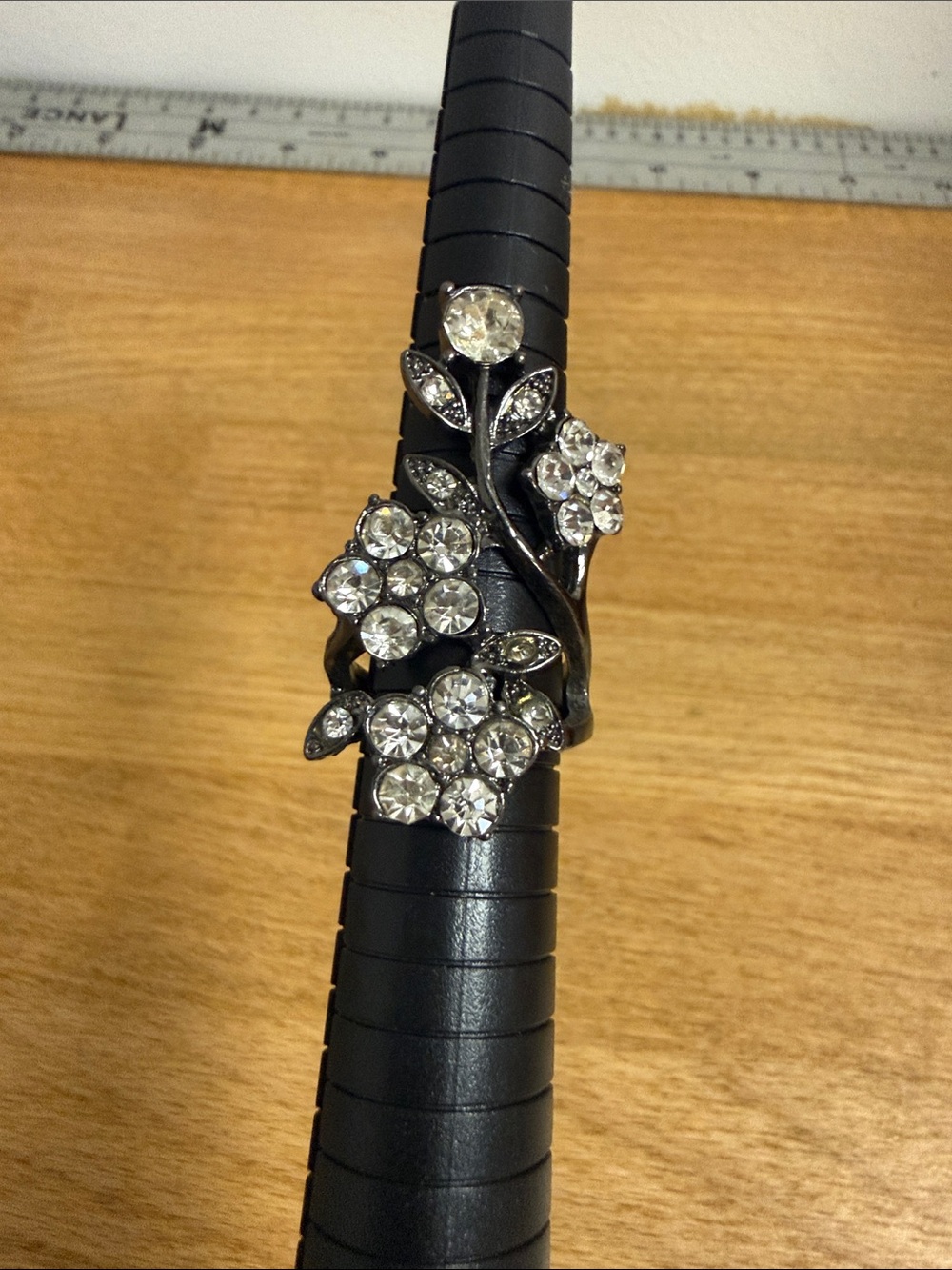 Gunmetal silver tone large statement cocktail ring with rhinestone flowers